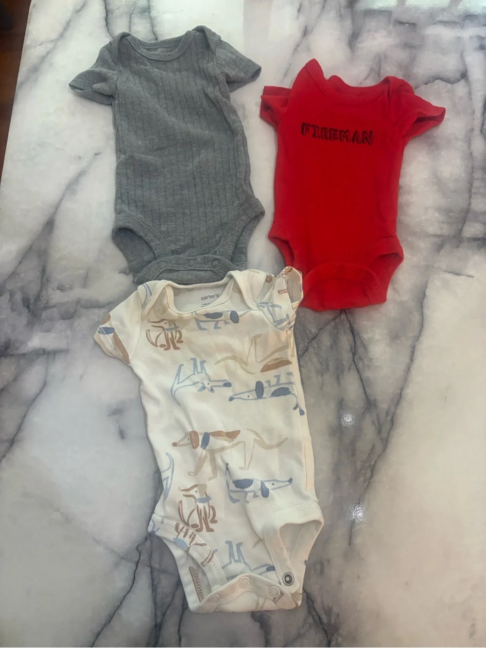 Carter's Three-Pack Baby One-Pieces in Cream Dog Print, Gray, and Red